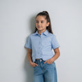 Blusa Celeste para Niña con Bolsillos Delanteros