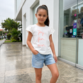 Polo Niña Blanco con Estampado Joy Fun Sun y Mangas Volantes