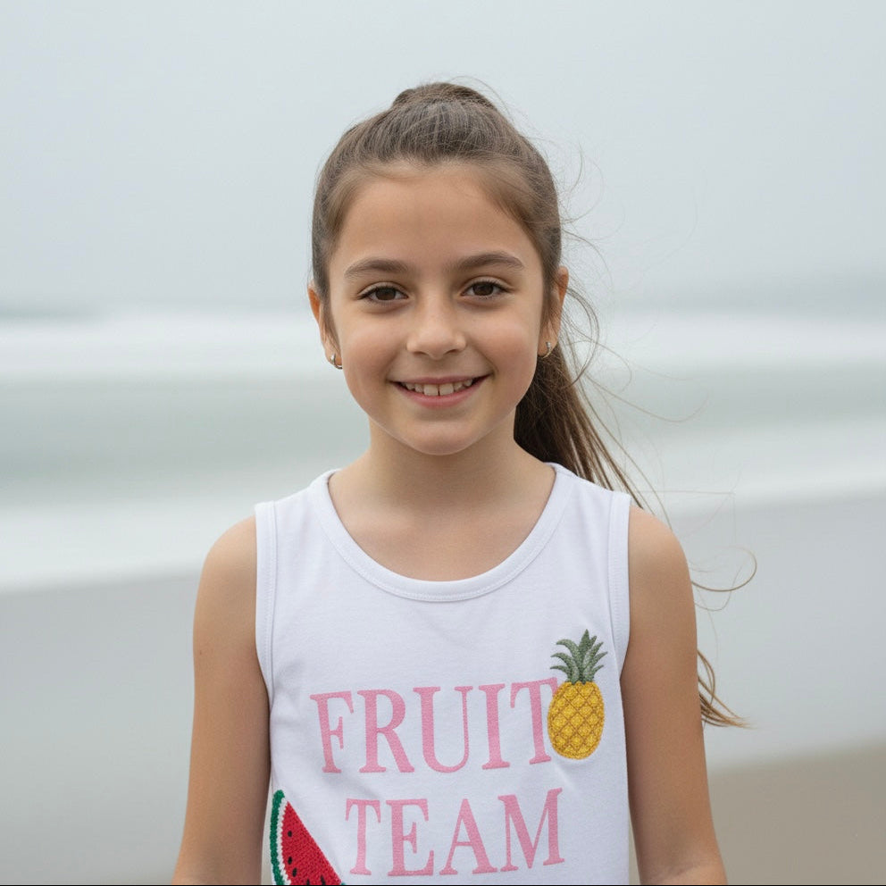 Polo sin manga blanco para niña con estampado de frutas – Angela Kids